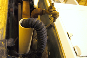 washing machine hose placed to drain into a standpipe