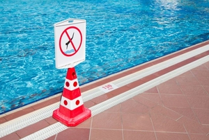 a red cone with a "do not dive" sign on it