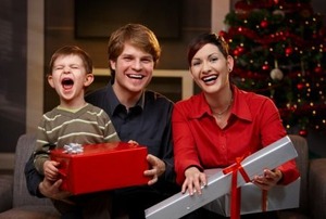 A Christmas family photo of a young family