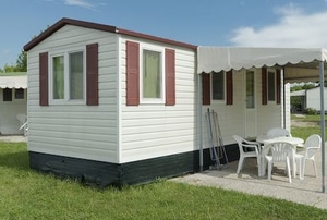 a mobile home with awning