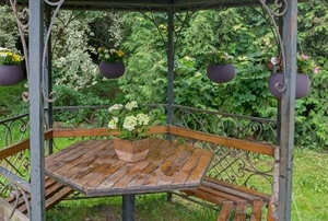 metal gazebo with built in bench and table