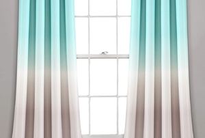 Long, ombre curtains on a window