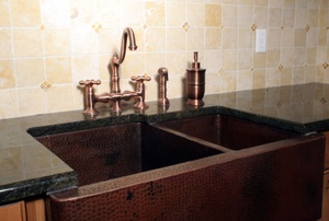 A copper kitchen sink.