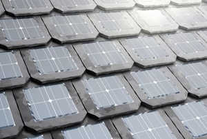 solar shingles on a roof in the sun