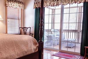 sliding glass doors leading out to a patio