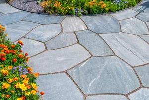 outdoor tiling around flower bed