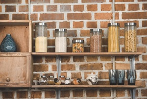 A brick wall in a kitchen.