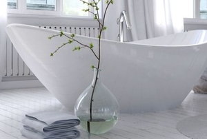stylish bathroom with freestanding curved bathtub