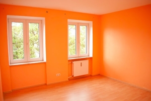 An orange room, charged with energy.