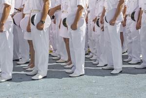 Rows of recruits wearing Navy whites
