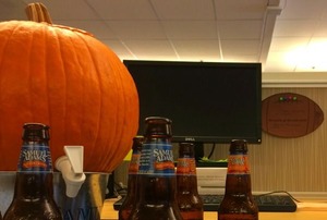A pumpkin keg at an office party.