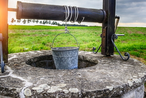 old fashioned water well with
