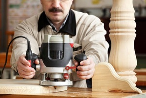 Man working with a router