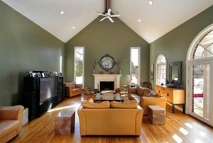 A family room with a vaulted ceiling.