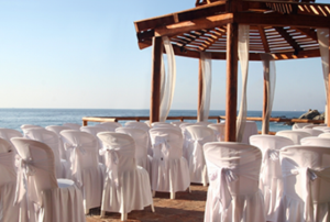 chairs lined up for an outdoor wedding