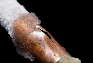 A copper pipe with freeze damage.
