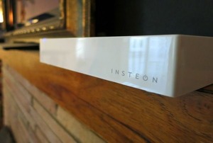 The Insteon hub on a living room mantle.