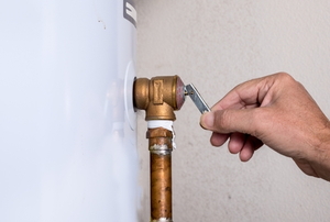 Hand Adjusting Water Heater Pressure Relief Valve