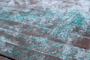 chemical ice melt on bricks with snow