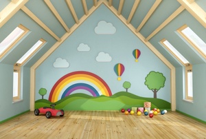 An attic playroom with a mural.