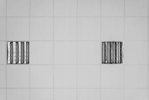 Looking up at a tile ceiling