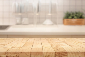 kitchen counters, one wood, one stone