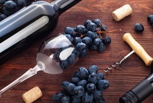 homemade wine supplies and unlabeled bottles