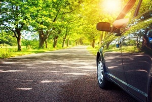 car driving in summer sun