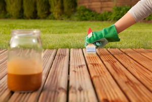 A deck being sealed.