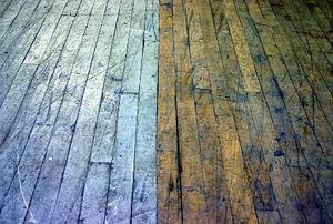 A wooden floor made from two different-colored types of board.