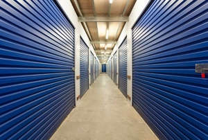 A hallway in a storage unit space.