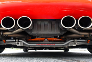 exhaust pipes on the back of a red car