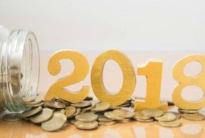 A jar with coins and the year "2018" spilling out.