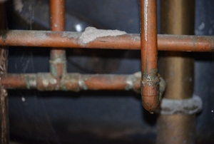 A set of copper water pipes.