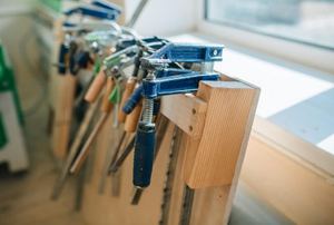 Row of clamps on a board