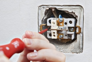 An open electrical outlet.