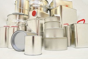 A stack of metal containers used for paint chemicals.