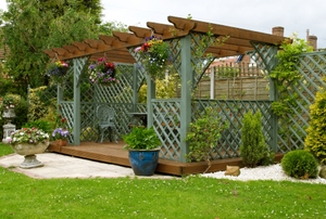 large pergola sitting area with deck