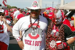 Ohio State Buckeyes fans tailgating in the parking lot
