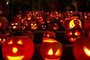 Glowing pumpkins at night.