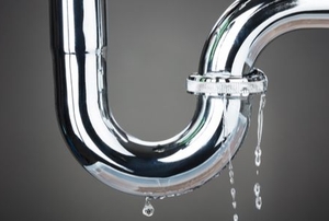 a curvy leaking pipe