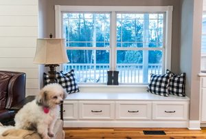 window seat with drawer cabinets and dog