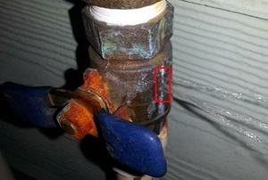 A ball valve with a gushing leak.