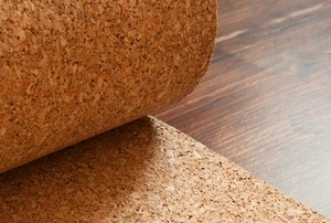 cork roll on a wood floor
