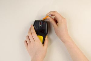 marking location of a wall stud using a stud finder