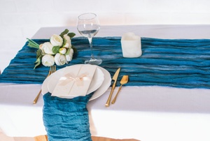 A blue table runner.