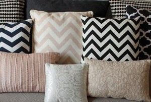 pillows with various designs, some in zig zags