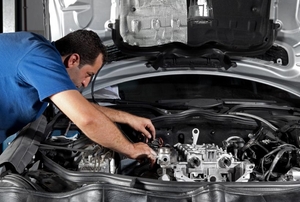 a person working on a car