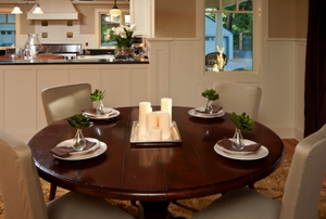 This modern dining room is set classy and has a pass through to the kitchen.