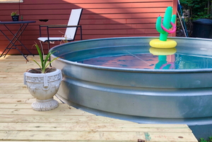 stock tank cowboy pool attached to deck